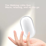 Warm Hand Treasure Ultra-T – dwustronny ogrzewacz do rąk z funkcją szybkiego nagrzewania i trzema poziomami temperatury. Kompaktowy ogrzewacz do rąk, który zmieści się w kieszeni